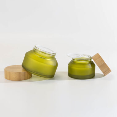 Green glass cosmetic jars with bamboo lids