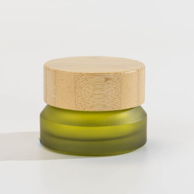 Green glass cosmetic jars with bamboo lids