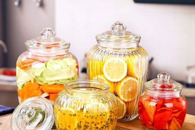 Glass pickle jars with wide mouth for kitchen storage (1) Wide-mouth kitchen glass pickle jars from factory