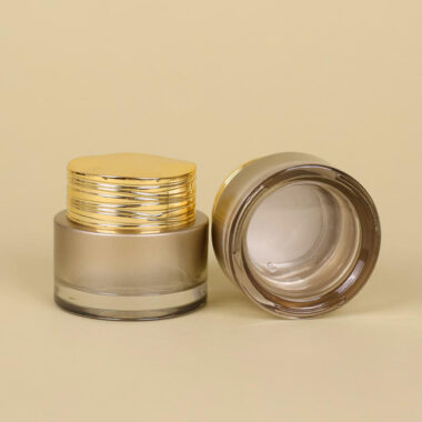 Frosted wide-mouth glass cosmetic jars with gold screw lids