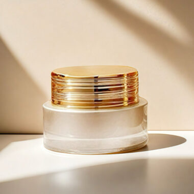 Frosted wide-mouth glass cosmetic jars with gold screw lids