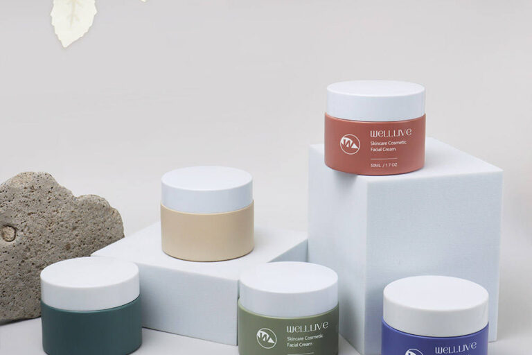 Luxury round empty cream jars with custom color options (6) Custom color round cream glass cosmetic jars manufacturer