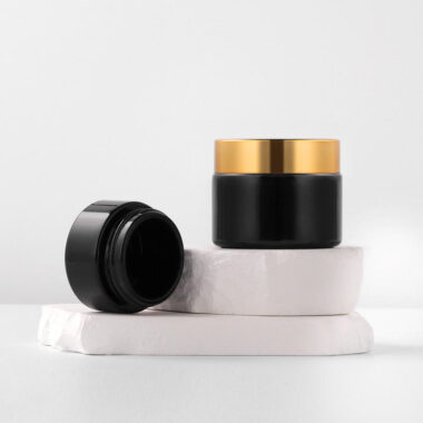 Black wide-mouth glass cosmetic jars for eye cream