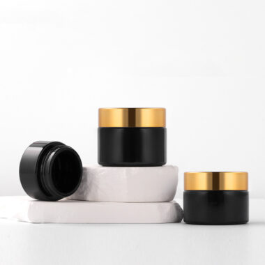 Black wide-mouth glass cosmetic jars for eye cream