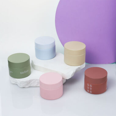 Luxury colored round glass cosmetic jars supplier