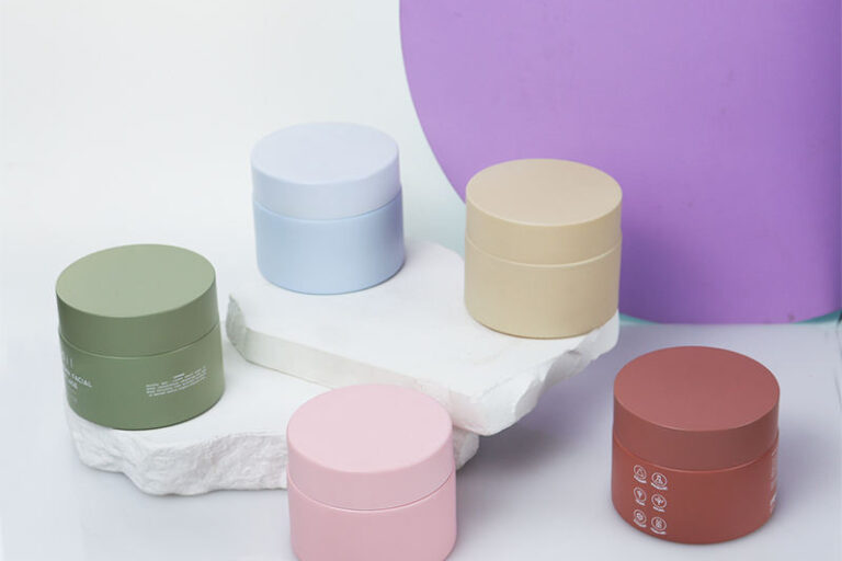 Premium luxury colored round cosmetic jars for skincare (5) Luxury colored round glass cosmetic jars supplier