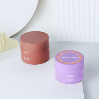 Luxury colored round glass cosmetic jars supplier